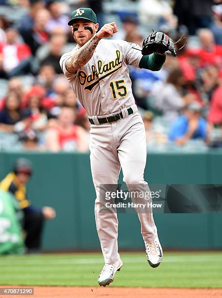 Brett Lawrie of the Oakland Athletics makes a throwing error to first allowing Drew Butera of the Los Angeles Angels of Anaheim on first during the...