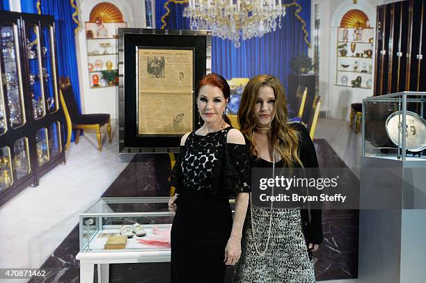 Actress Priscilla Presley and Singer Lisa Marie Presley attend the ribbon-cutting ceremony during the grand opening of "Graceland Presents ELVIS: The...