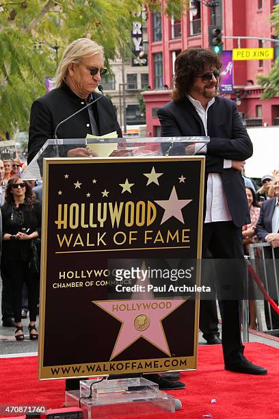 Musician Joe Walsh and Jeff Lynne attend a ceremoney honoring Jeff Lynne with a Star on The Hollywood Walk of Fame on April 23, 2015 in Hollywood,...