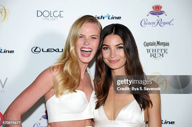 Models Anne Vyalitsyna and Lily Aldridge arrive at SI Swimsuit South Beach Soiree at The Gale South Beach on February 20, 2014 in Miami Beach,...