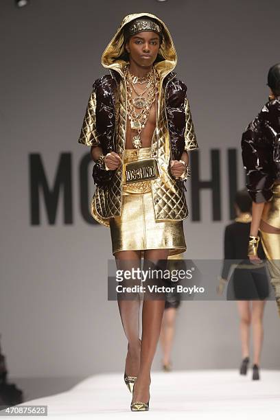 Model walks the runway during Moschino show as part of Milan Fashion Week Womenswear Autumn/Winter 2014 on February 20, 2014 in Milan, Italy.