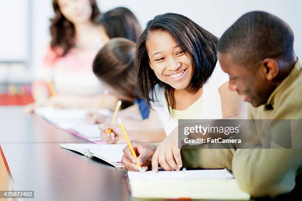 Helping Others In Class Middle School Classroom Setting Photos and Premium High Res Pictures ...