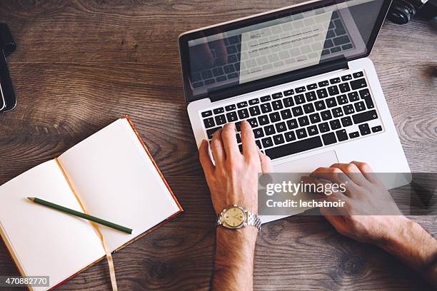 typing on the keyboard - letter document stockfoto's en -beelden