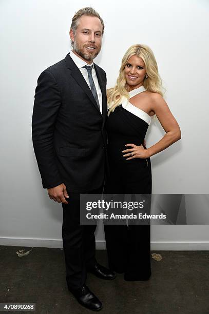 Singer Jessica Simpson and her husband Eric Johnson attend a special preview of "The Gleason Project" at ZEFR Warehouse on April 23, 2015 in Venice,...