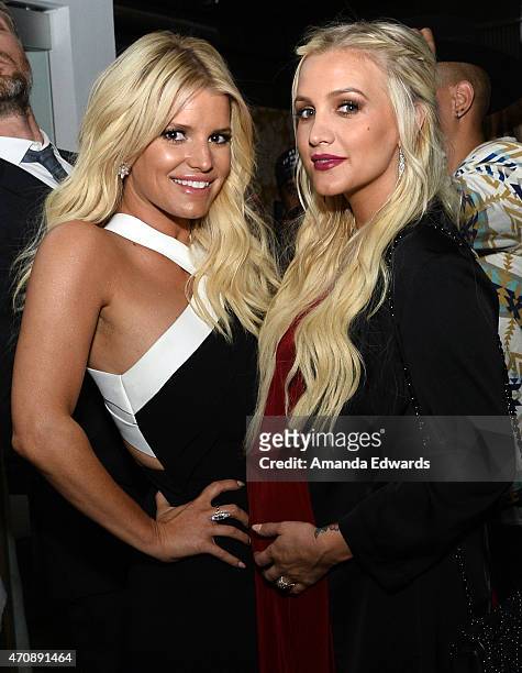 Singers Jessica Simpson and Ashlee Simpson attend a special preview of 'The Gleason Project' at ZEFR Warehouse on April 23, 2015 in Venice,...
