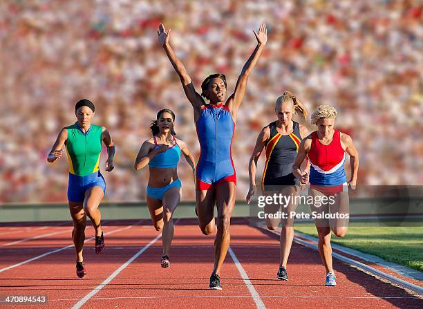 runners at finish line - finishing line stock pictures, royalty-free photos & images