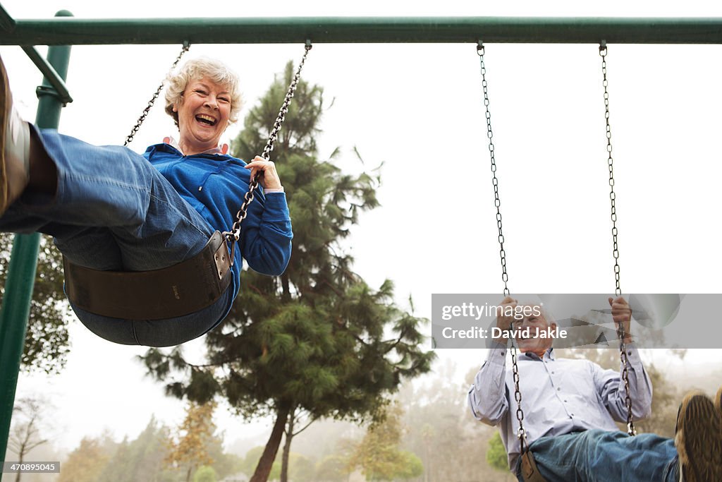 Husband and wife on swing