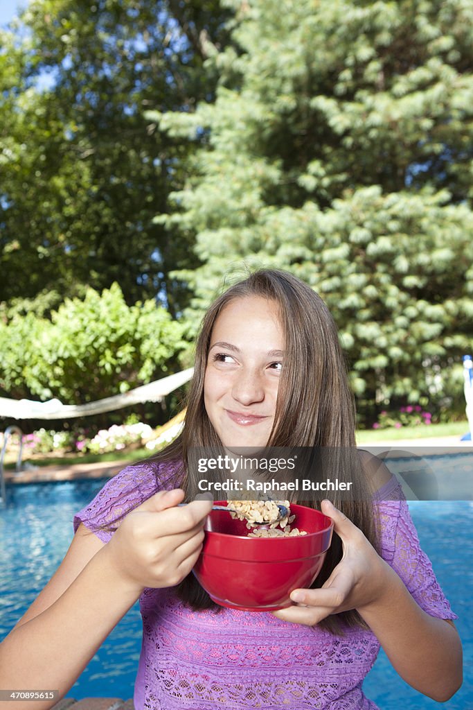 Eating In The Pool Girl Eating By Pool High-Res Stock Photo - Getty Images