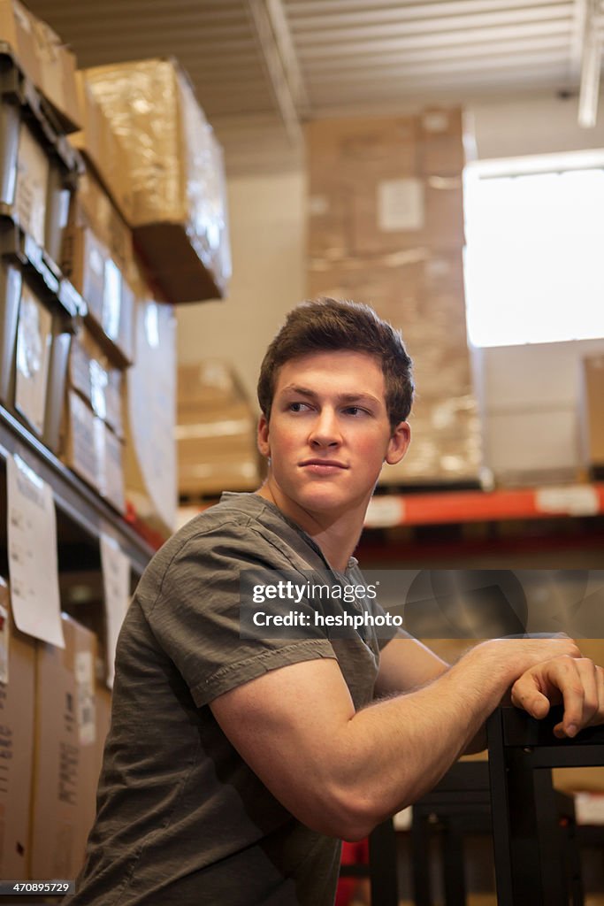 Worker standing in warehouse