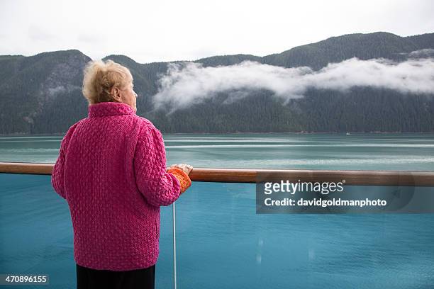 senior woman on cruise ship, alaska, usa - alaska cruise stock pictures, royalty-free photos & images