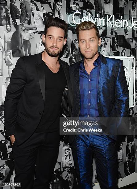 Artist Michael Turchin and tv personality Lance Bass attend Opening Ceremony and Calvin Klein Jeans' celebration launch of the #mycalvins Denim...