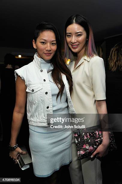 Fashion blogger Tina Leung and model Irene Kim attend Opening Ceremony and Calvin Klein Jeans' celebration launch of the #mycalvins Denim Series with...