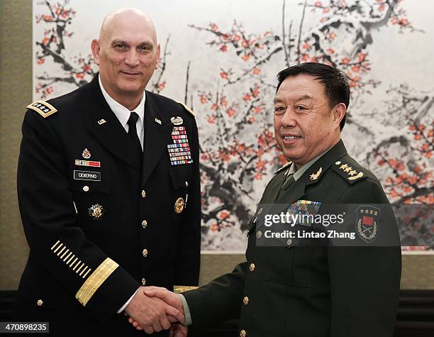 Army Chief of Staff Gen. Ray Odierno shake hands with Fan Changlong, Deputy Chaiman of the Central Military Commission at Bayi Building on February...