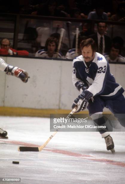 Eddie Shack of the Toronto Maple Leafs skates with the puck during an NHL game against the New York Rangers circa 1974 at the Madison Square Garden...