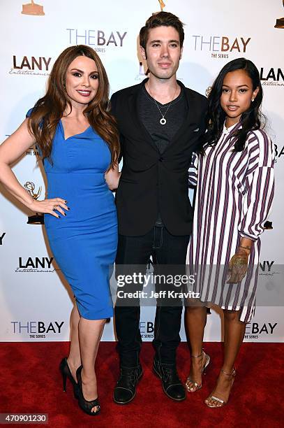 Lily Melger, Kristos Andrews, and Karrueche Tran at Open Air Kitchen + Bar on April 23, 2015 in Los Angeles, California.