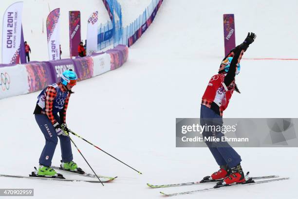 Marielle Thompson of Canada celebrates winning the gold medal with silver medalist Kelsey Serwa of Canada in the Freestyle Skiing Womens' Ski Cross...