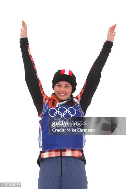 Marielle Thompson of Canada celebrates winning the gold medal during the flower ceremony in the Freestyle Skiing Womens' Ski Cross Final on day 14 of...