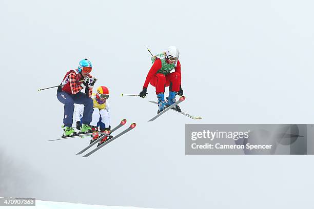 Marielle Thompson of Canada, Yulia Livinskaya of Russia and Sanna Luedi of Switzerland compete in the Freestyle Skiing Womens' Ski Cross...