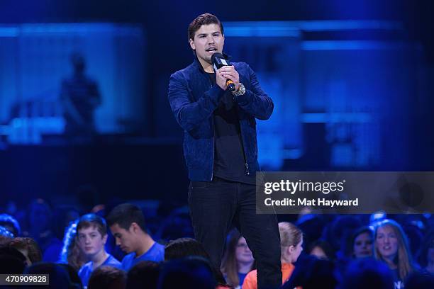 Actor Luke Bilyk speaks on stage during We Day at KeyArena on April 23, 2015 in Seattle, Washington.