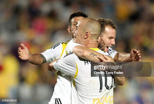 Jeremy Brockie and team mate Stein Huysegems of the Phoenix celebrate a goal during the round 20 A-League match between the Central Coast Mariners...