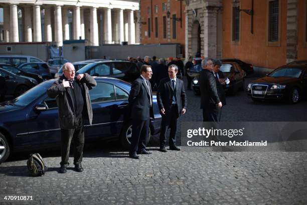 Drivers and security officials wait for the finish the Extraordinary Consistory on February 21, 2014 in Vatican City, Vatican. Pope Francis will...