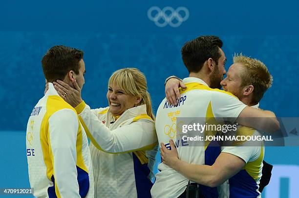 Sweden's Oskar Eriksson and Sweden's Sebastian Kraupp teammates celebrate after winning the men's Bronze medal match between Sweden and China at the...