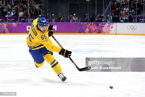 Erik Karlsson of Sweden handles the puck against Finland during the Men's Ice Hockey Semifinal Playoff on Day 14 of the 2014 Sochi Winter Olympics at...