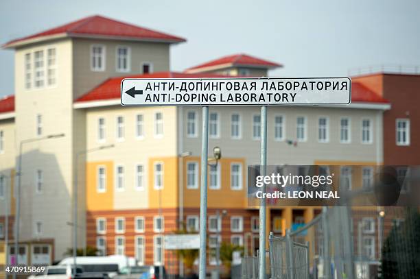 Sign shows the direction to the anti-doping laboratory of the 2014 Winter Olympic Games on February 21, 2014 at the Olympic Park in Sochi, as a...