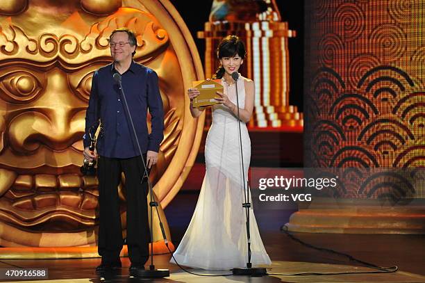 Fernando Meirelles, jury member of the 5th Tiantan Award, and actress Angie Chiu attend the closing ceremony of the 5th Beijing International Film...