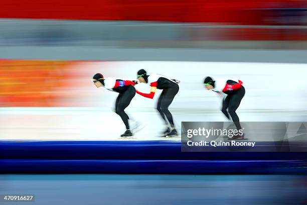 Denny Morrison, Lucas Makowsky and Mathieu Giroux of Canada compete during the Men's Team Pursuit Quarterfinals Speed Skating event on day fourteen...