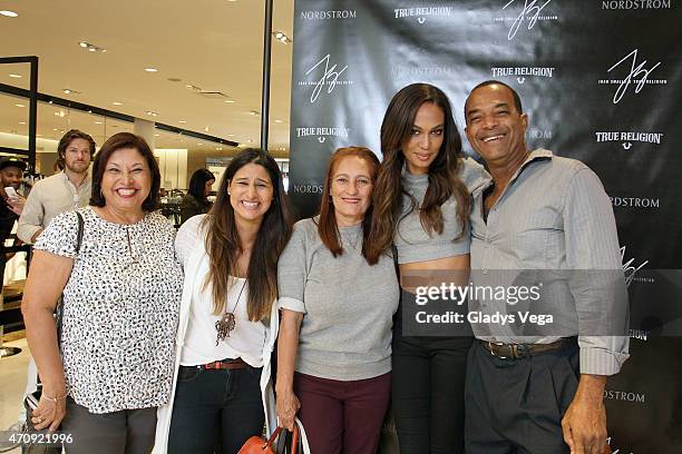 Joan Smalls posed with her parents and friends as part of True Religion event at Nordstrom San Juan on April 4, 2015 in San Juan, Puerto Rico.