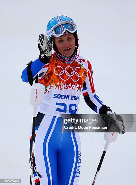 Anemone Marmottan of France reacts after her first run during the Women's Slalom during day 14 of the Sochi 2014 Winter Olympics at Rosa Khutor...