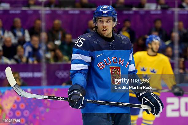 Sami Vatanen of Finland looks on during the Men's Ice Hockey Semifinal Playoff against Sweden on Day 14 of the 2014 Sochi Winter Olympics at Bolshoy...