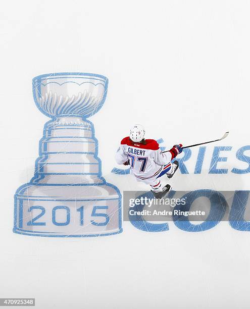 Tom Gilbert of the Montreal Canadiens skates over the in-ice Stanley Cup logo during warmup prior to playing against the Ottawa Senators in Game Four...