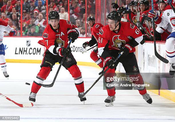 Kyle Turris and Mark Stone of the Ottawa Senators skate up ice with the puck against the Montreal Canadiens in Game Four of the Eastern Conference...