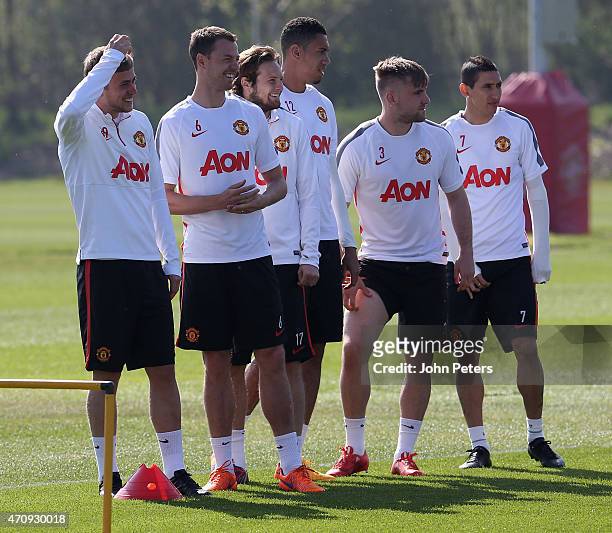 James Wilson, Jonny Evans, Daley Blind, Chris Smalling, Luke Shaw and Angel di Maria of Manchester United in action during a first team training...