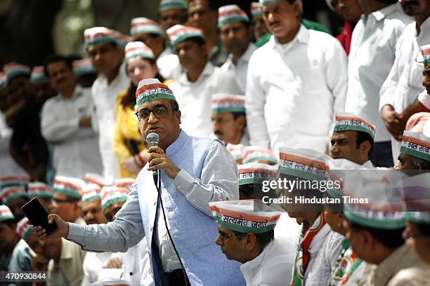 Delhi Congress Chief Ajay Maken address party workers during protest against the alleged move by the BJP-led Central Government to deny net...