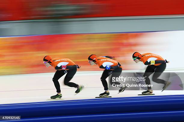Jorien ter Mors, Ireen Wust and Lotte van Beek of the Netherlands compete during the Women's Team Pursuit Quarterfinals Speed Skating event on day...