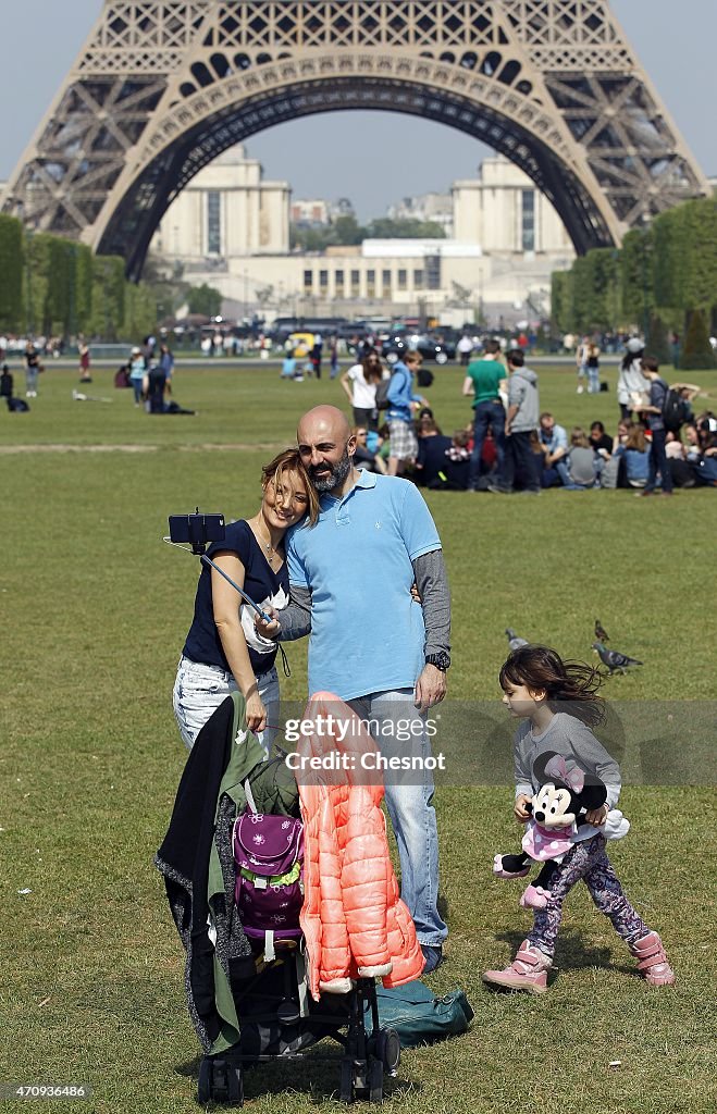Tourists Visit Eiffel Tower