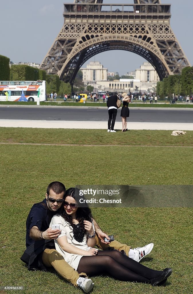 Tourists Visit Eiffel Tower