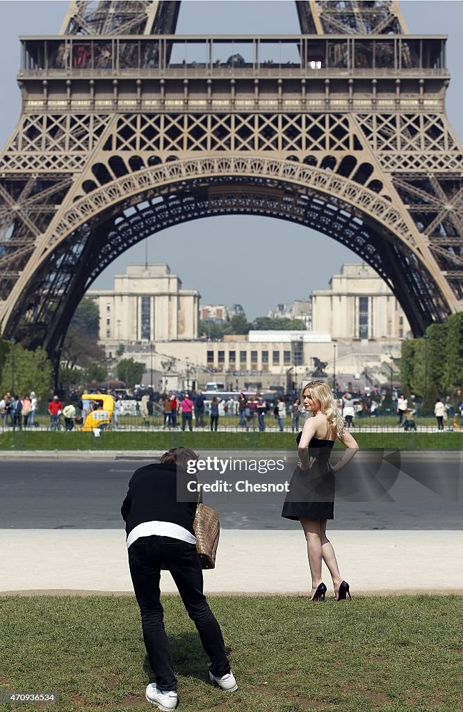 Tourists Visit Eiffel Tower