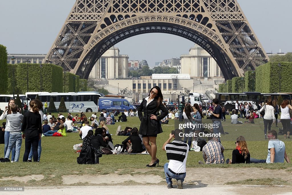 Tourists Visit Eiffel Tower