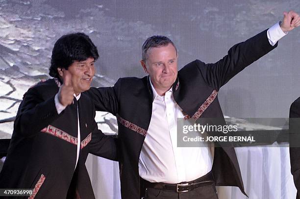 Bolivian President Evo Morales and Rally Dakar director Etienne Lavigne give the thumb up during the presentation of the 2016 Rally Dakar in La Paz...