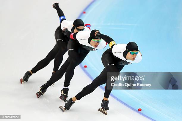 Denny Morrison, Mathieu Giroux and Lucas Makowsky of Canada compete during the Men's Team Pursuit Semifinals Speed Skating event on day fourteen of...
