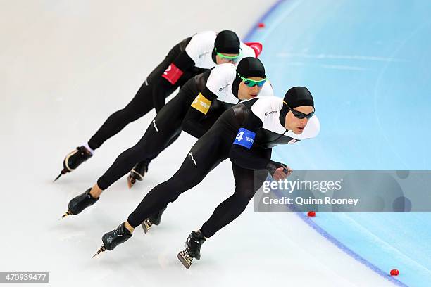 Mathieu Giroux, Lucas Makowsky, Denny Morrison of Canada compete during the Men's Team Pursuit Semifinals Speed Skating event on day fourteen of the...