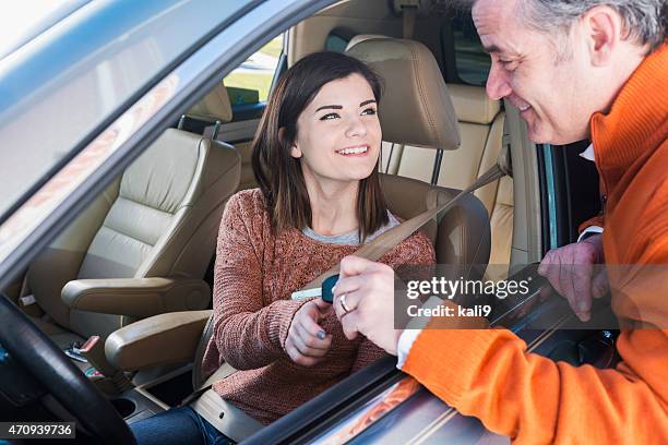 father giving daughter key to  car - daughter driving stock pictures, royalty-free photos & images