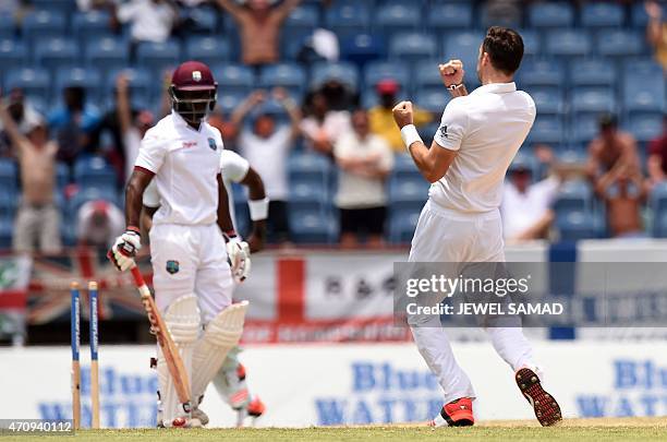 England's bowler James Anderson celebrates bowling out West Indies batsman Devon Smith during day four of the second Test cricket match between the...