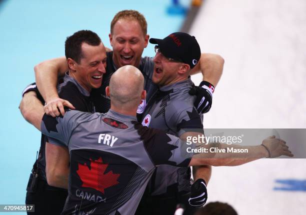 Harnden, Brad Jacobs, Ryan Fry and Ryan Harnden of Canada celebrate as they win gold during the Men's Gold Medal match between Canada and Great...