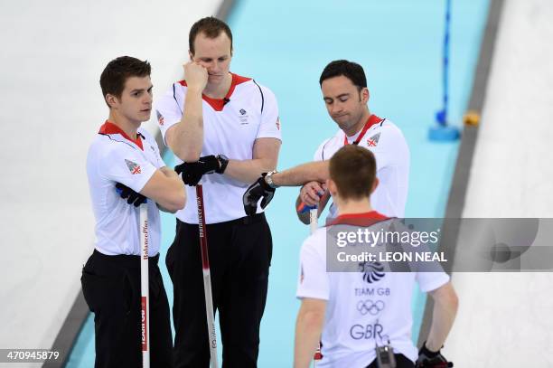 Great Britain's Scott Andrews, Michael Goodfellow, David Murdoch and Greg Drummond react during the Men's Curling Gold Medal Game between Canada and...