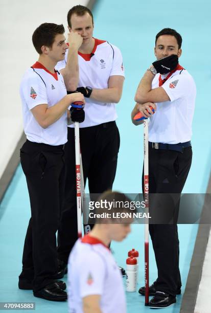 Great Britain's Scott Andrews, Michael Goodfellow and David Murdoch react during the Men's Curling Gold Medal Game between Canada and Great Britain...